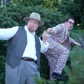 Floy (Nathaniel Jones) and Pontdue (Mick Etchoe) run after being discovered by the Keystone Cops.