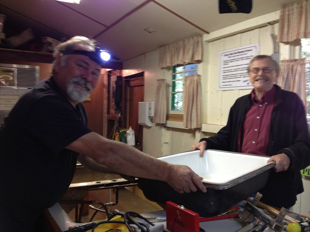 Craig & Brian removing cast iron sink