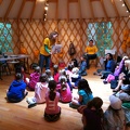 KFAC Week 1  Charity reading to campers in yurt