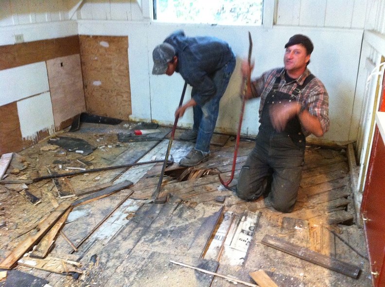 Jim Hamilton removing old floor