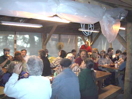 Players eating in woodshed